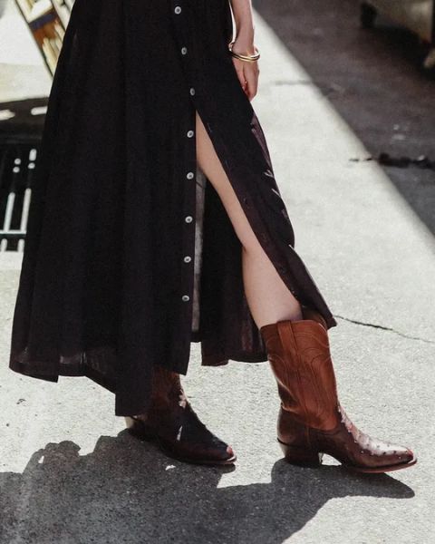 woman wears black dress and The Jessie from Tecovas