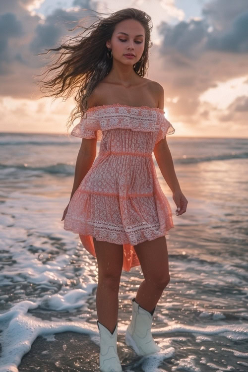 A woman wears white cowboy boots with an off-shoulder tiered dress