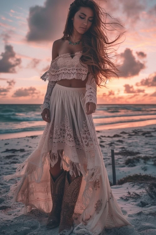 a woman wears cowboy boots with a lace flowy two piece dress